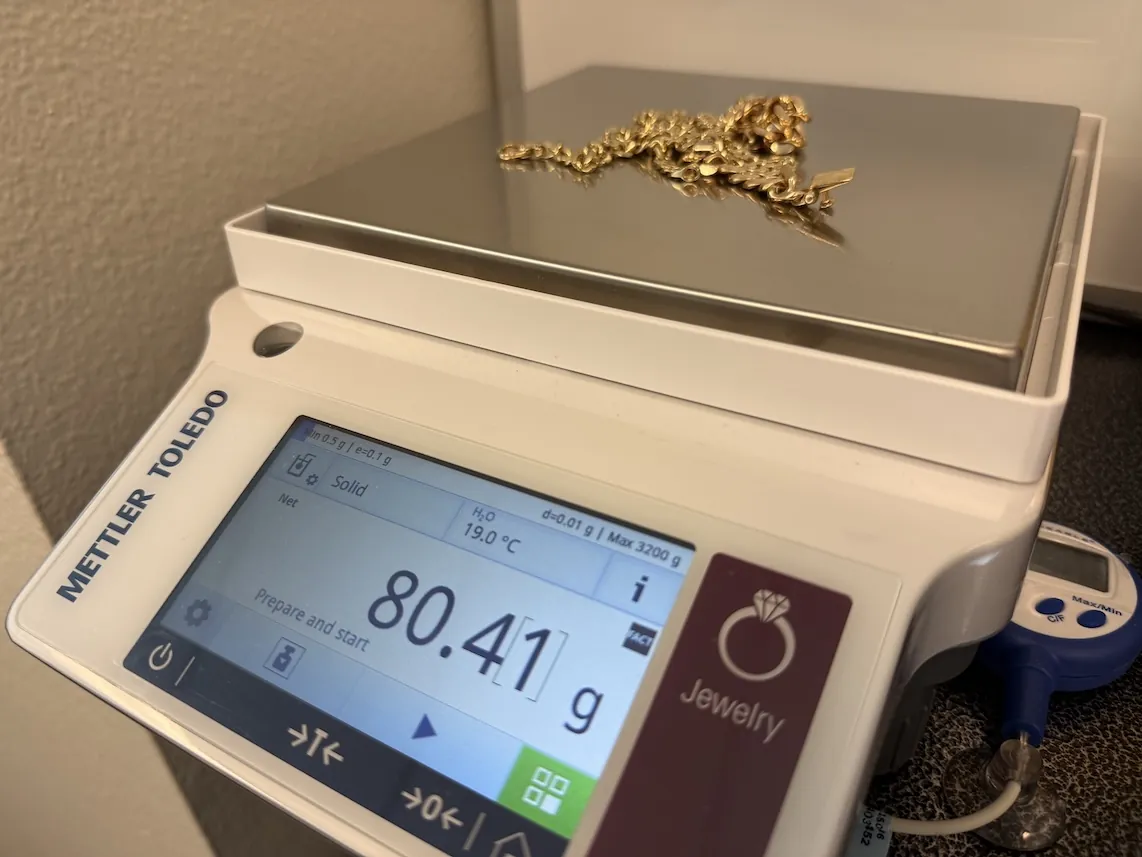 Gold jewelry on precision scale
